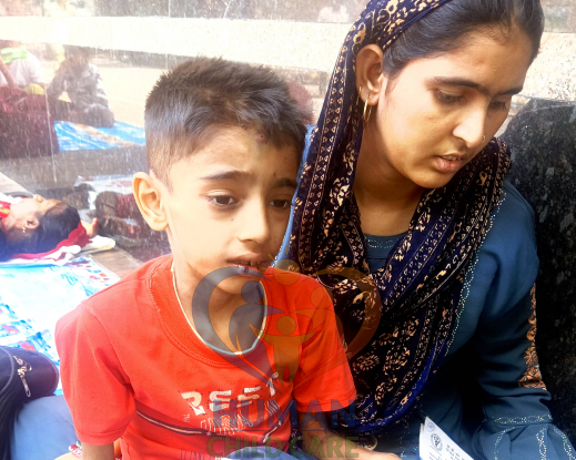 Suhan with his mother during treatment